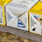 Leite reprocessado? O que significam os quadrados coloridos no fundo da caixa de leite